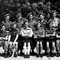 Gordon Graham (front row, sitting in centre with pale shirt) and his unit before being despatched to India in 1942
